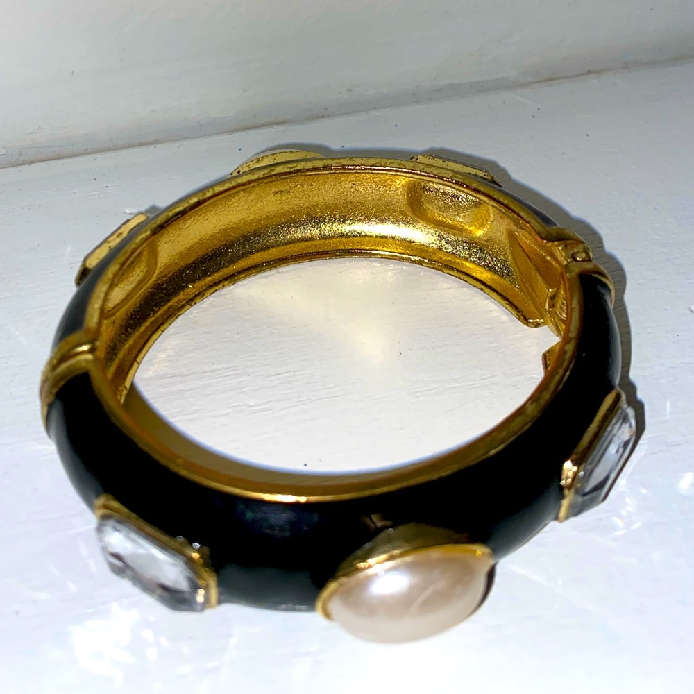 Black lacquered embellished bangle with faux pearl and stone detail